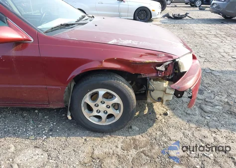 1999 Toyota Camry Le from USA, damaged, VIN 4T1BG22K7XU611639